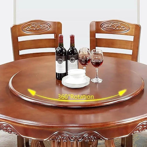 Big Ol Solid Wood Lazy Susan Turntable Rotating Serving Tray With Buttery Smooth Glide Swivel Base For Dining Tables Kitchen Islands And Party Buffets on a dining table with wine and glasses.