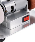 Close-up of Compact Mini Bench Grinder Featuring Rock Solid 100W Copper Brushless Motor Spinning At Ridiculous 6000 RPM controls and motor.