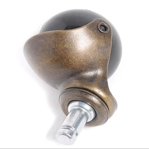 Heavy Duty Antique Ball Casters Deliver Hella Smooth Swivel Operation With Classic Brass Look built from tough steel, measuring 1.5 inches wide.
