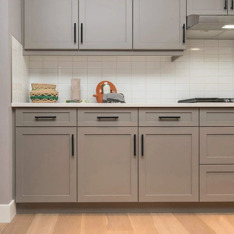 Slick Matte Black Cabinet Handles And Drawer Pulls With Three Inch Centers And Five Inch Overall Length In An Eighteen Pack for gray cabinetry.
