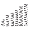 Various sizes of steel springs from 200 Piece Spring Set Kit With 40 Size Variations For Mechanical Equipment.
