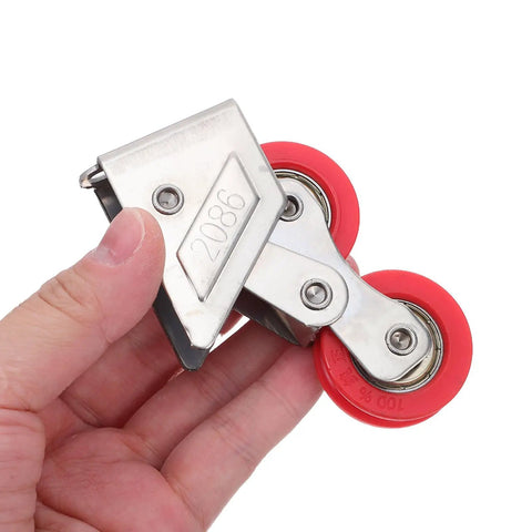 Smooth As Butter Premium Heavy Duty Double Wheel Sliding Door Rollers, stainless steel with red wheels, hand-held view.