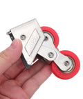 Heavy Duty Double Wheel Sliding Door Rollers And Stainless Steel Window Glide Replacement Pulleys in hand with red wheels.