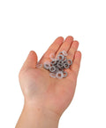 Hand holding assorted Heavy Duty Metal Wedge Locking Washers for Drum Rack Mounting Hardware and Cymbal Stand secure fasteners.