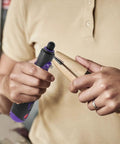Tough As Nails Multi Speed Mini Electric Angle Grinder With 82 Piece Bit Set in use for wood etching.