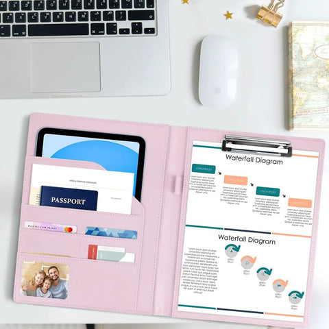 Open pink padfolio for women and men with clipboard, holding A4 documents, cards, and pen loop, displayed on a desk.