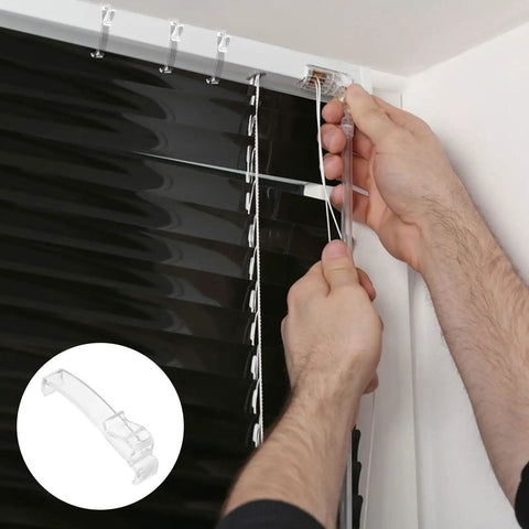 Person installing Thirty Piece Set Of Transparent Valance Clips For Window Blinds 2.5 Inch Hidden Track Holders on blinds.
