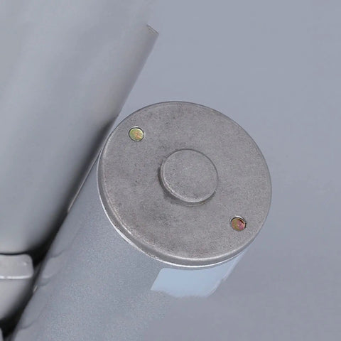 Close-up of 12 V Heavy Duty Linear Actuator electric motor end cap showing metal construction and sealing features.
