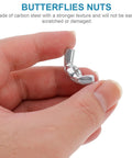 Hand holding a shiny butterfly nut made of carbon steel for secure fastenings, showcasing its smooth curve design.