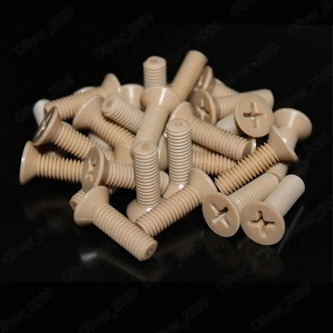 Premium PEEK Plastic Phillips Countersunk Flat Head Screws M6 X 40mm Pack Of Twenty piled on a surface, showing flush heads and threads.