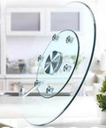 Clear Tempered Glass Lazy Susan Turntable With Silent Bearings And Six Smooth Rolling Wheels For Effortless 360 Spin On Your Kitchen Or Dining Table Making Serve Up Meals A Total Breeze At Home viewed from the side with emphasis on wheels.