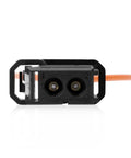 Front view: two-piece fiber optic bypass loop adapters, black plastic housing with orange cable