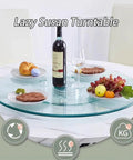 Glass Lazy Susan Turntable For Kitchen And Dining Table Featuring A Smooth Operator Spin With Straight Up Badass Durability Huge Tempered Glass Serving Tray Silent Swivel Base total game changer for hosting with wine and food.