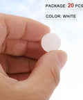 Hand holding a 5/8 inch solid white polypropylene bearing ball from a 20 pack, ideal for custom rig builds and DIY projects.