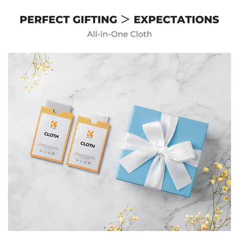 K&F Concept microfiber lens cleaning cloths, 2-pack, in orange-striped packaging next to a blue gift box with white ribbon.