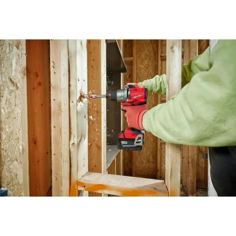 Top Shelf Heavy Duty New Brushless Cordless Drill Driver Kit Compatible With M18 Power Tools Featuring Automatic Stop Function Half Inch Quick Release Chuck Tool drilling into wood frame