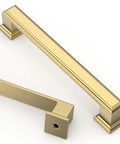 Slick Brushed Brass Cabinet Handles For Kitchen Upgrade Set Of Ten 5 Inch Heavy Duty Metal Pulls With Tough Rust Resistant Coating and Easy Screw Install angled view