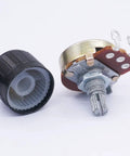 Close-up of Wh138 100K Ohm Potentiometer Set Three Pack Single Turn Rotary Potentiometer with aluminum knob cap and shaft visible.