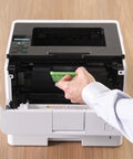 Office Printing Powerhouse Fast 50 Pages Per Minute Monochrome Laser Printer With Wireless Networking And Duplex Auto-Printing Packed With Advanced Security Features For High-Volume Business Tasks, close-up of toner installation