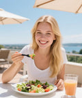 Person enjoying a salad with Mini Black Sporks 4.2 Inch 100 Pack Individually Wrapped Disposable Cutlery Set For Desserts Ice Cream Cakes