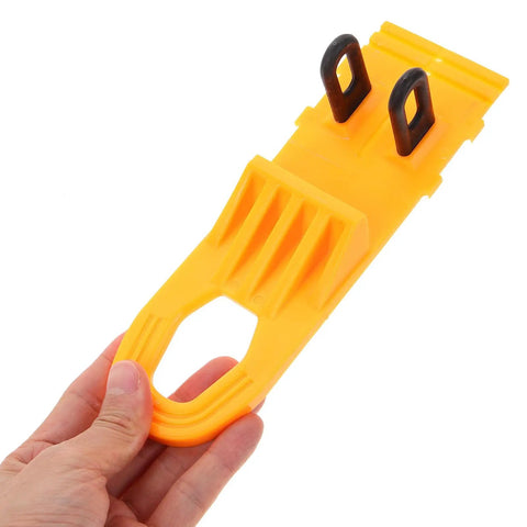 Professional Grade Paintless Dent Removal Kit Featuring Sturdy Pullers And Strong Glue Tabs To Knock Out Dinged Up Bumpers Fenders And Hoods Restore Your Banged Up Ride Clean Now, yellow puller in hand.