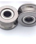 Top Tier Bearing Steel Linear Pulley With U Groove And V Groove Guides For Heavy Duty Shop Builds Featuring Smooth Riding Deep Groove Ball Bearings In Four By Thirteen Seven MM Dimensions, close-up of steel pulleys.