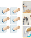 6 Piece Extra Long Wooden Wall Hooks Self Adhesive Coat Rack For Doors Easy Peel Stick, showcasing the wooden pegs mounted on surfaces.