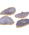 Set Of Four Top Shelf Natural Agate Cabinet Knobs With Burnished Gold Edges, rock solid geode drawer pulls, gray agate with brass hardware.
