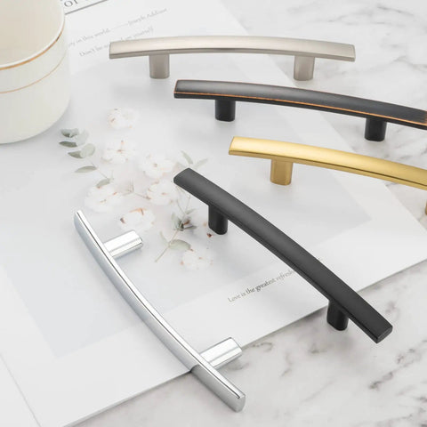 Top Tier Matte Black Cabinet Pulls And Drawer Handles 10 Pack solid metal handles in matte black, silver, gold, and brushed finishes on a tabletop.