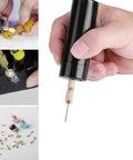 Kickass Rechargeable Electric Drill With Extended Battery Life And Precision Bits For Heavy Duty Diy Tasks and Quick Home Fixes Without Any Sweat Or Frequent Charging, held in hand with drill bit visible.