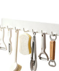 Premium Heavy Duty Self Adhesive Coat Rack Wall Mount Featuring Seven Robust Hooks For A Total Breeze Entryway Organization Dorm Room Key Holder Storage Rack with kitchen utensils.