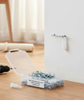 Box of 100 Pack Nylon Drywall Anchors With Screws For Hollow Walls, Heavy Duty Hang Your Pictures, Shelves And Decor Kit on a floor