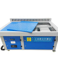 Heavy Duty Metalworking Downdraft Table Dust Collector With Multi Side Suction Panels For Shop Debris That Knocks Out Fine Dust Easy And Runs Super Smooth in blue and gray with perforated top and control panel.