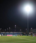 Badass 600W Led Outdoor Stadium Flood Light 48000 Lumen illuminating a sports field at night, perfect for players and activities.