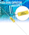 Top Shelf Polyester Film Capacitor Kit 630V 0.022uF Axial Leads on a circuit board, showcasing a single yellow axial capacitor.