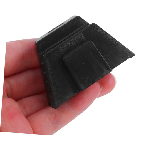 Close-up of a black modular wrench organizer tray piece, part of a 12-piece set for home garage workbench storage, durable plastic tool rack.