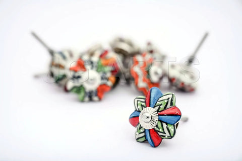Set Of Ten Totally Rad Vintage Ceramic Drawer Pulls And Cupboard Cabinet Door Knobs Featuring Super Sleek Multicolor Designs Plus Rock Solid Chrome Hardware close-up of a vividly designed ceramic drawer knob.