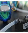 Heavy Duty Adjustable Automatic Dosing Pump With Flow Smoothing Tech showing black pump with tubing for precision chemical dosing.