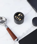 Game Changing Geared Espresso Leveler With Magnetic Coffee Distributor Needle Fits All Standard Portafilters - aluminum and wood tools on marble counter.
