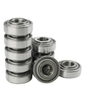 Built Tough 203KRR2 Bearing 0.64 Inch Bore 10 Pack Sealed Agriculture Bearings in a stack, metal material for farm equipment.