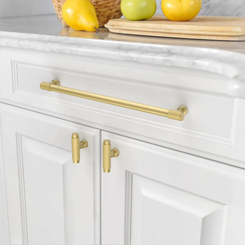 Heavy Duty Brushed Gold Knurled Cabinet Pulls 10 Inch Hole Center Handle Set on white kitchen cabinetry with fruit.