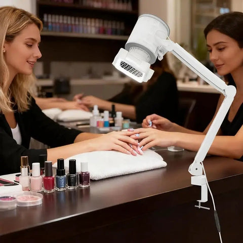 Professional Nail Dust Collector With Universal Table Mount And Tilt Adjustable Arm in use during acrylic nail sculpting.