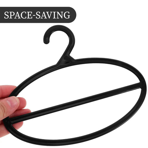 10 Pack Black Plastic Scarf Organizer With Rotating Swivel Design For Closet Storage Space Saving Multi Layer Hanger close-up of hand holding organizer
