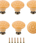 Set Of Six Bright Yellow Ceramic Cabinet Knobs Featuring Classic Floral Handles That Are Hella Durable And Ready For Zero Drama Cleanup This Total Kitchen Game Changer Adds Sweet Vintage Vibes To Any Drawer Or Cupboard Upgrade. Six textured yellow ceramic knobs with screws for cabinets.