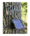 Trail Ready Solar Power Pack For 12 Volt Trail Cameras 2 Pack Bundle Camo Tree Mount with charge meter attached to tree