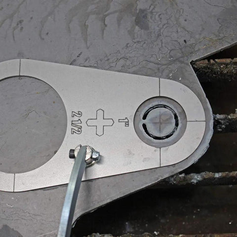 Close-up of Plasma Stencil Circle Cutter Guide Kit 5 Piece Set With .580 Inch Circle Sizes And 10 Hole Sizes showing 2 1/2 inch cut