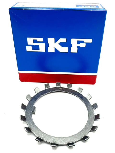 Pro Grade W11 Lock Washer For Bearings With 2.18 Inch Inner Diameter And 3.109 Outer Diameter 0.053 Inch Width displayed beside SKF box.