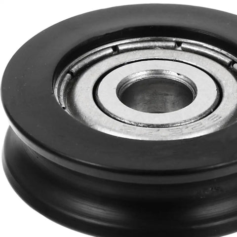 Close-up of a nylon pulley roller with a sealed bearing, part of 4 Pack Slick Nylon U Wheel Guide Pulley Rollers For Heavy Duty Sliding Closet Doors Zero Fuss Replacement Track Hardware Silky Smooth Operation Easy Quick Fit Home Refresh.