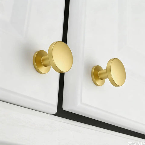 30 Pack Gold Cabinet Knobs And Brushed Brass Drawer Pulls With A Sleek Round Shape Made From Heavy Duty Zinc Alloy for easy grip on white cabinets.