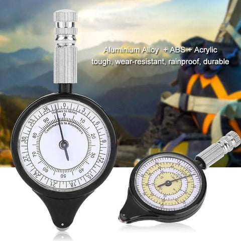 Trail Tested Map Measuring Wheel Odometer For Camping Hiking And Backcountry Adventures Built Like A Tank And Smooth Rolling Action Super Lightweight Pocket Gear on scenic background.